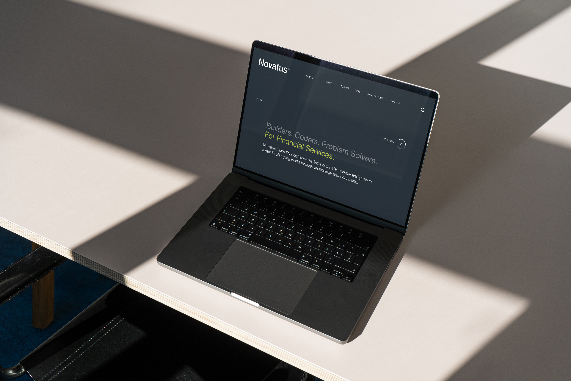 Novatus website design on laptop